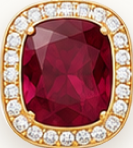 Ruby gemstone in an 18K gold setting with diamond halo